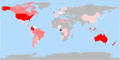 World map showing countries in gray, white and in various shades of red. The U.S. and Australia stand out as bright red (which the caption identifies as the 60–80% color). Brazil and Canada are medium pink (40–60%). China, much of western Europe, and central Africa are light pink (1–20%). Germany, Japan, Nigeria, and Venezuela are white (<1%).