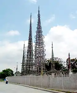 Watts Towers in the Watts community of Los Angeles, Southern California – a collection of 17 interconnected sculptural structures, the tallest reaching a height of over 99 feet (30 m).