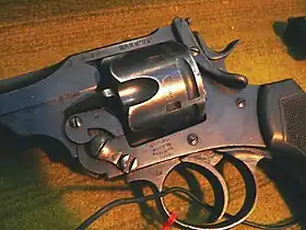 Close up of the cylinder (including thumb catch) on a Webley Mk VI service revolver