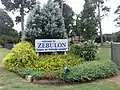 Former wood Welcome to Zebulon Sign