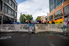 Barricaded street with banners