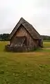 The Farmer's House, constructed in 2007. Attached to the building is an experimental wooden-slate roof.