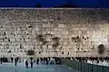 The Western Wall, also known as the Wailing Wall and the Kotel, is a remnant of the Second Temple and the holiest place where Jews are permitted to pray.