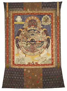 A traditional Tibetan thangka showing the bhavacakra. This thangka was made in Eastern Tibet and is currently housed in the Birmingham Museum of Art.