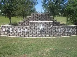 Wheeler welcome sign