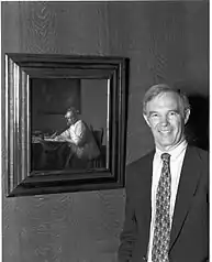 Wheelock, in front of A Lady Writing a Letter painted by Johannes Vermeer, at the National Gallery of Art.