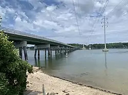 The southern end of the cove, to the right of the Ellis C. Snodgrass Memorial Bridge here, viewed from Cousins Island