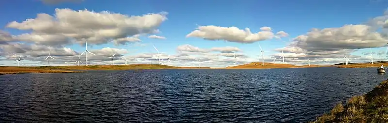 Image 20A panoramic view of the United Kingdom's Whitelee Wind Farm with Lochgoin Reservoir in the foreground. (from Wind power)