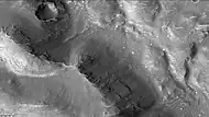 Layers in wall of Lampland Crater, as seen by CTX camera (on Mars Reconnaissance Orbiter).  Note: this is an enlargement of the previous image of Lampland Crater.