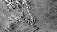 Redi Crater, showing dust devil tracks and mantle, as seen by CTX camera (on Mars Reconnaissance Orbiter).  Note: this is an enlargement of the previous image of Redi Crater.