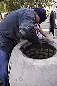 Samsa preparation in a tandoor