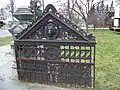 Elaborate cast and wrought iron garden gate.