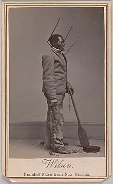 Wilson Chinn, a branded slave from Louisiana--Also exhibiting instruments of torture used to punish slaves