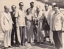 Diptendu Pramanick with Frank Capra, latter deluged with garlands at the Dum Dum airport, Calcutta in 1952