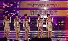 Wonder Girls in retro outfits performing "Nobody"