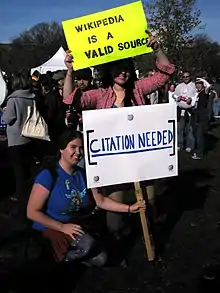 Combined with a sign saying "Wikipedia is a valid source"