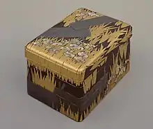 Inlaid maki-e raden writing Box with "Eight Bridges" ( yatsuhashi ) design, by Ogata Kōrin, National Treasure, Edo period, 18th century. The flowers are abalone shell inlays. Tokyo National Museum