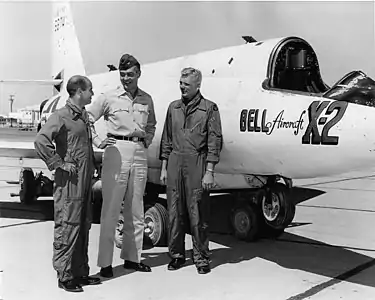 X-2 pilots Capt. Milburn "Mel" Apt and Capt. Iven Kincheloe flank Col. Horace Hanes, AFFTC flight test director