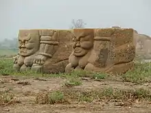 Fierce, hag-like grave guardians sculpted on two stele bases, mausoleum no. 3, Western Xia mausoleums.