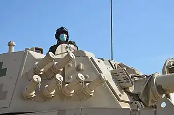 Smoke discharges on ZTL-11 assault gun