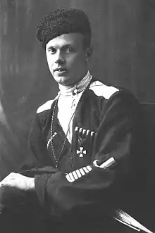 Portrait photograph of Yakov Slashchov, wearing a black Cossack garb