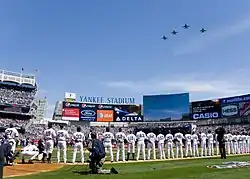 A team of baseball players standing on a field