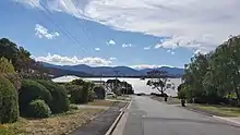 Iconic views from Yolla Street, Rose Bay with the MONA ferry passing by.