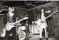 The Young Snakes playing the Underground, Allston, Massachusetts. From left to right are Doug Vargas, Dave Bass Brown, and Aimee Mann.