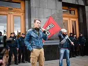 Iurii Gudymenko Gudimenko, Ukrainian blogger and politician, at the rally against Ihor Kolomoisky, near President Office, Kyiv, Bankova Str.