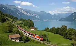 Image 14Zentralbahn Interregio train following the Lake Brienz shoreline, near Niederried in Switzerland (from Alps)