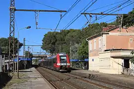 A TER service passing through the Gare de Milhaud