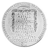 Back side of the commemorative medal minted in 1910.