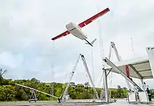 Zipline drone taking off from Zipline distribution center