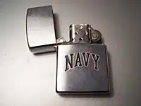 An open full-size Navy Zippo