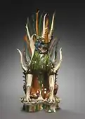 Tomb guardian; early 700s; glazed earthenware, sancai (three-color) ware; Cleveland Museum of Art (Cleveland, Ohio, USA)