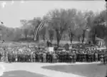 Crowd gathered around the statue during its unveiling