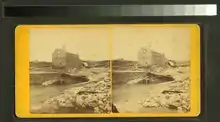 Stereoscopic image from a flipbook of the mill, dam.and ruins after an 1876 flood of the Mills River