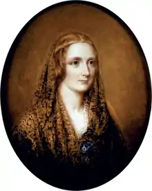 Oval portrait of a woman wearing a shawl and a thin circlet around her head. It is painted on a flax coloured background.