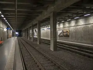 Underground station with double track and side platforms