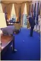 President Richard M. Nixon and Bob Hope play golf in the Oval Office, a tradition harking back to the tenure of Lyndon B. Johnson.