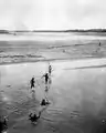 Local fishermen with fishing nets crossing Rio Pilcomayo 1908.
