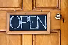 A sign indicating that a shop is open