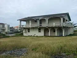 This apparently abandoned house is directly above Little Bay.