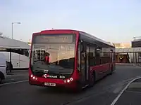 The bus - the cheapest option by far but slow.