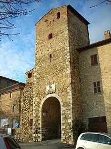  The main gate of Compignano