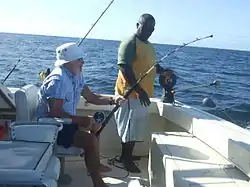 Colonel Sid is into a decent Wahoo (known locally as King Fish) on the boat Billfisher II.