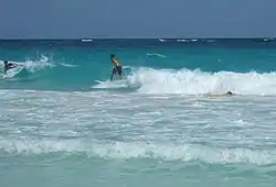 Surfing on the Crane beach requires patience, timing, skill and fitness of the participating locals.